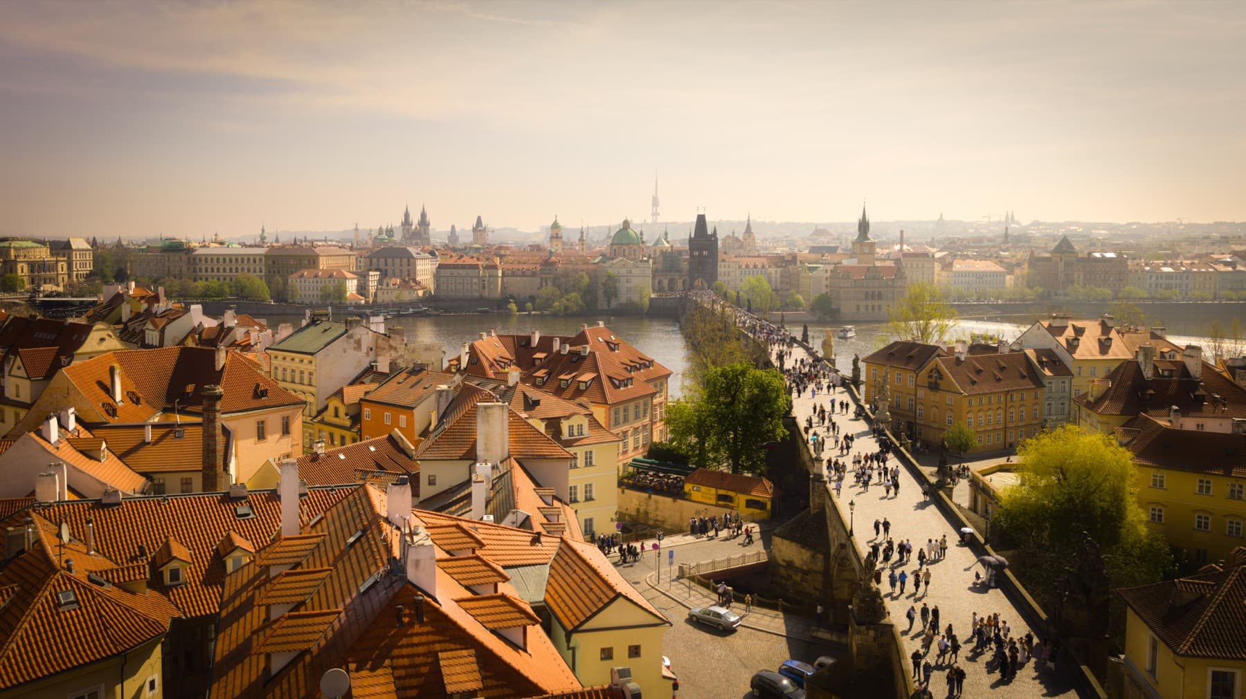Charles Bridge and Prague skyline at golden hour